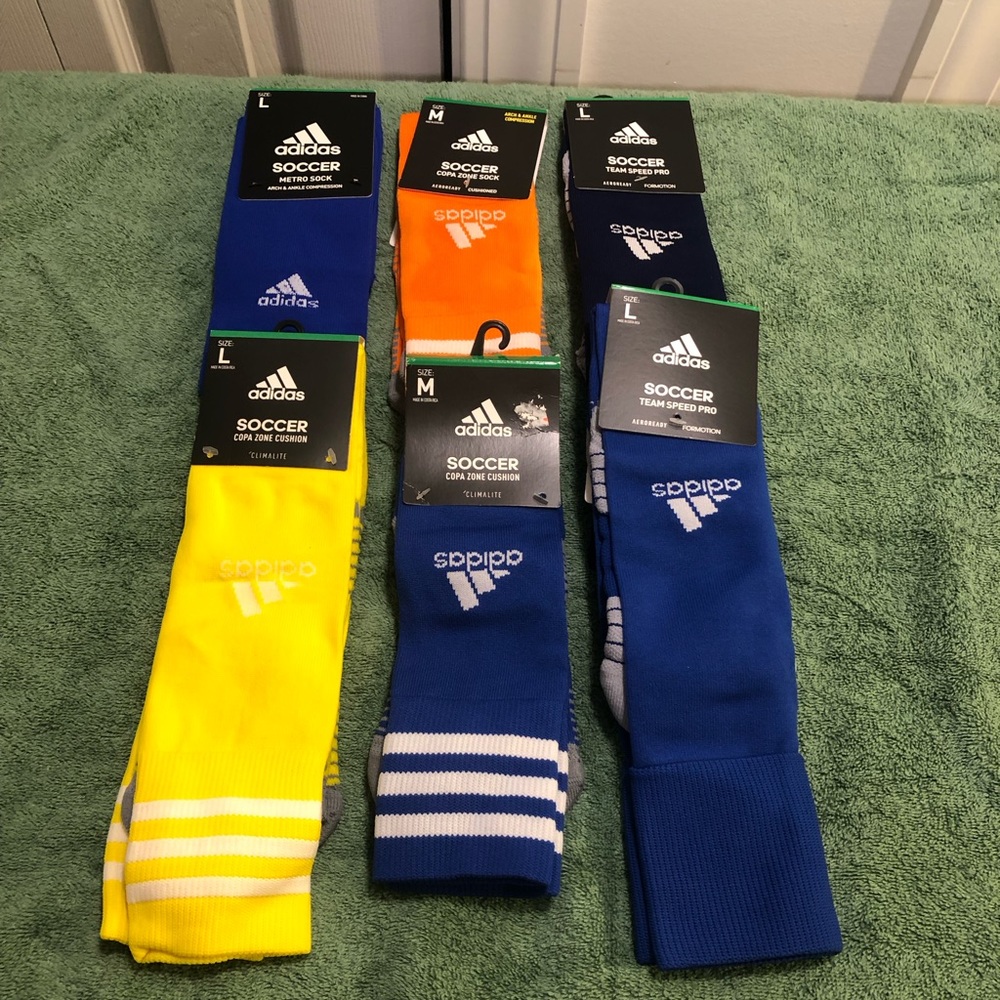 6 pairs of adidas soccer socks. 4 large and 2 medium, NWT